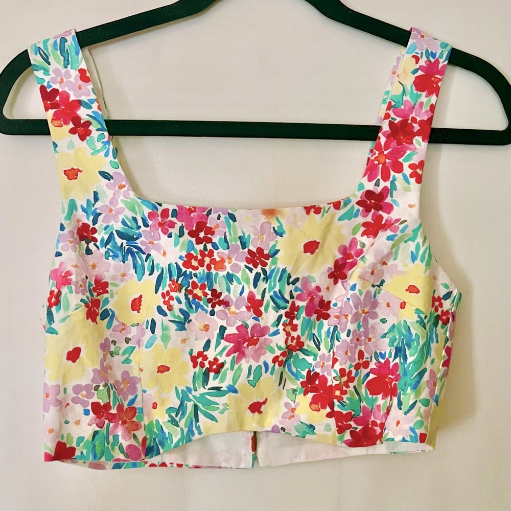 Matching crop top to awesome floral pants. Turn heads in this beautiful set.